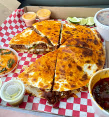 918 Maples Tacos and Cantina signature dishes Birria PizzaEmpanadasQuesabirria Taco